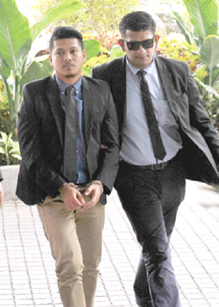 Ex-Ministry Sec-Gen and son charged